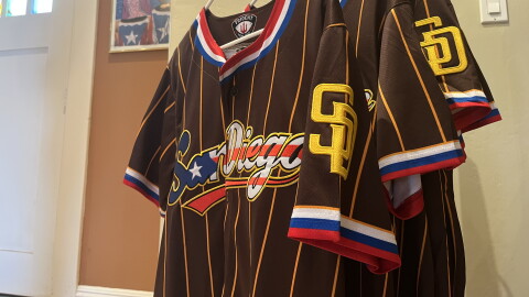 A Puerto Rico inspired Padres jersey hangs inside the House of Puerto Rico in Balboa Park on Aug. 19, 2026.