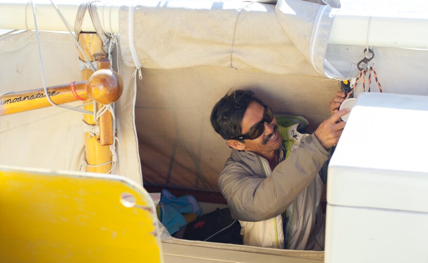 Behind the canvas on both sides of the boat are the small, 6-foot "holes," or cubbies, which are the sleeping quarters for crew members. They have a sleeping bag, clothes and a few personal effects for the journey. Underneath the sleeping mat is storage space for food, water and other supplies.