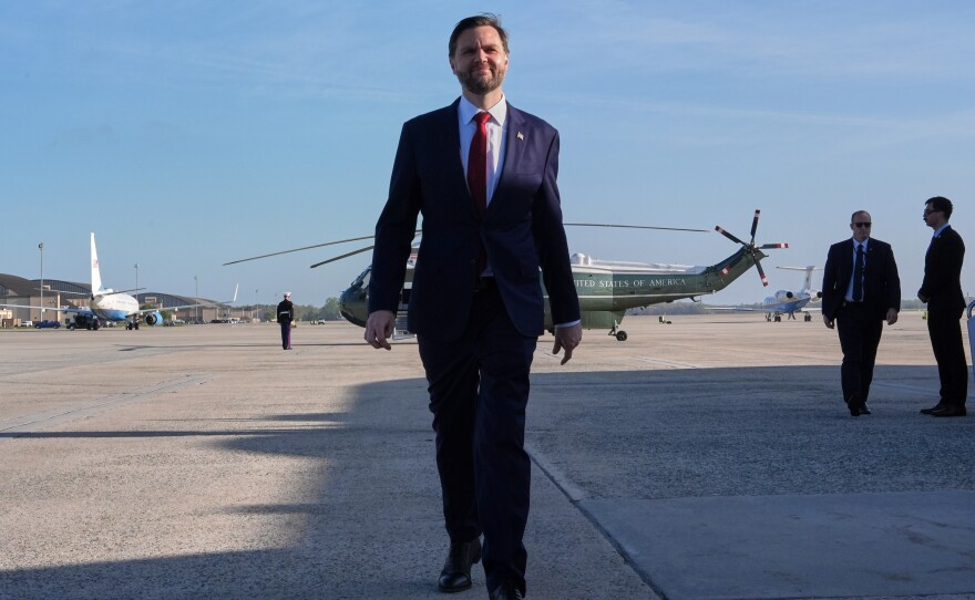 Vice President JD Vance walks to speak with the Press before boarding Air Force Two, Friday, April 10, 2026, at Joint Base Andrews, Md., for expected departure to Pakistan, for talks on Iran.