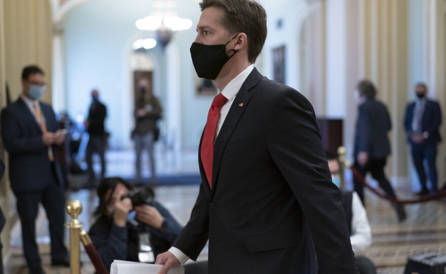 Sasse leaves the chamber as the Senate voted to consider hearing from witnesses in the impeachment trial of former President Donald Trump.