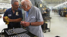 Anthony Maglica (right), the founder of Mag Instrument, visits the factory floor in Ontario, Calif., nearly every morning. He is dedicated to manufacturing the company's flashlights in the U.S.