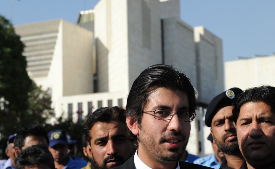 Arsalan Iftikhar Chaudhry (center), son of Pakistan's Supreme Court Chief Justice Iftikhar Muhammad Chaudhry, leaves the Supreme Court after attending a hearing. He is facing allegations of accepting bribes from a powerful property developer totaling some $4 million.