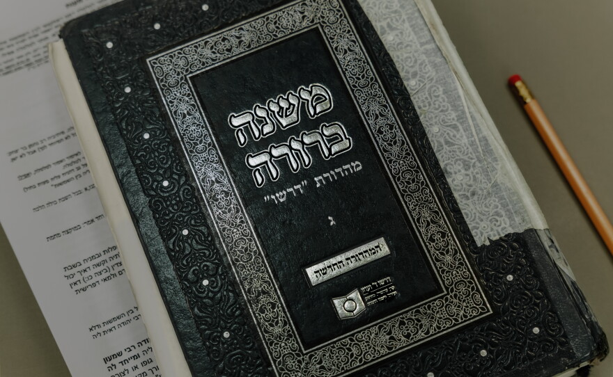 A copy of Mishnah Berurah, a text of Jewish law, sits in a classroom during a women's study session at Matan in Ra'anana.