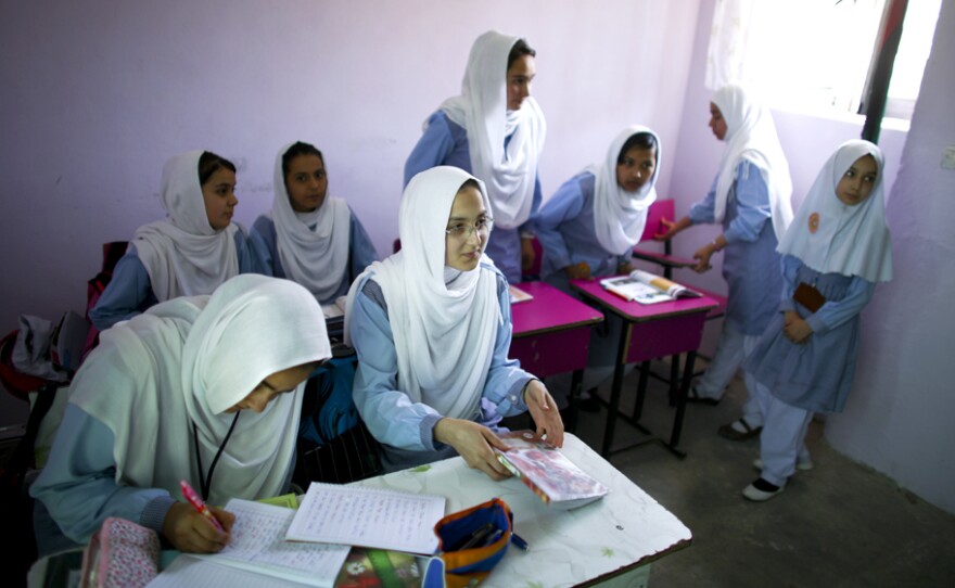 These girls are the lucky ones — they've been able to stay in school while many of their peers have dropped out. From the story "Meet The Cool Girls At A High School In Kabul: #15Girls," 2015.