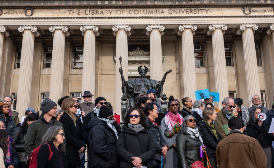 Members of Columbia University's faculty hold a protest in support of free speech on the Columbia University campus in November.