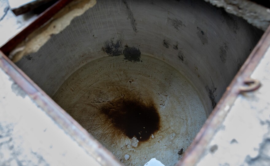 The <em>alberca</em> outside Ana Troncoso's home is nearly empty — until the next water delivery arrives. There's just enough water at the bottom to keep the cistern from cracking in the summer heat.