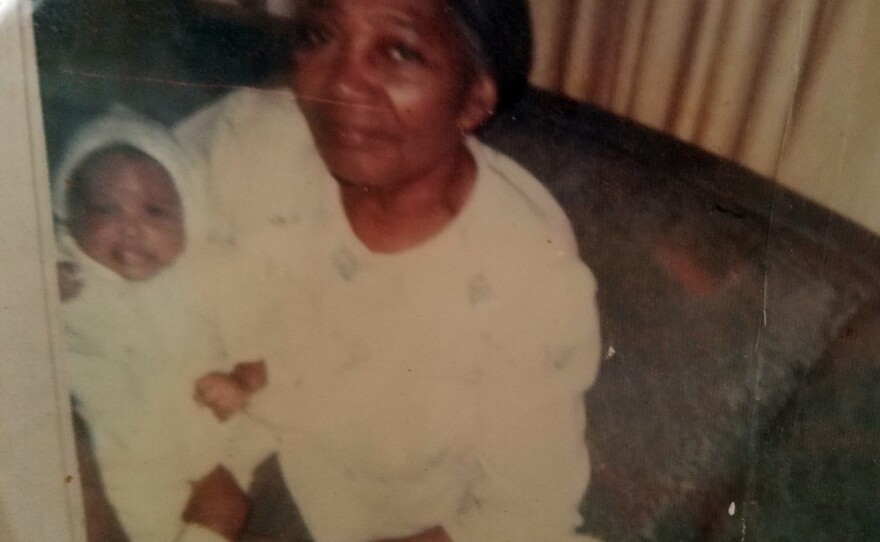 An old family photo shows James Carter and his grandmother.