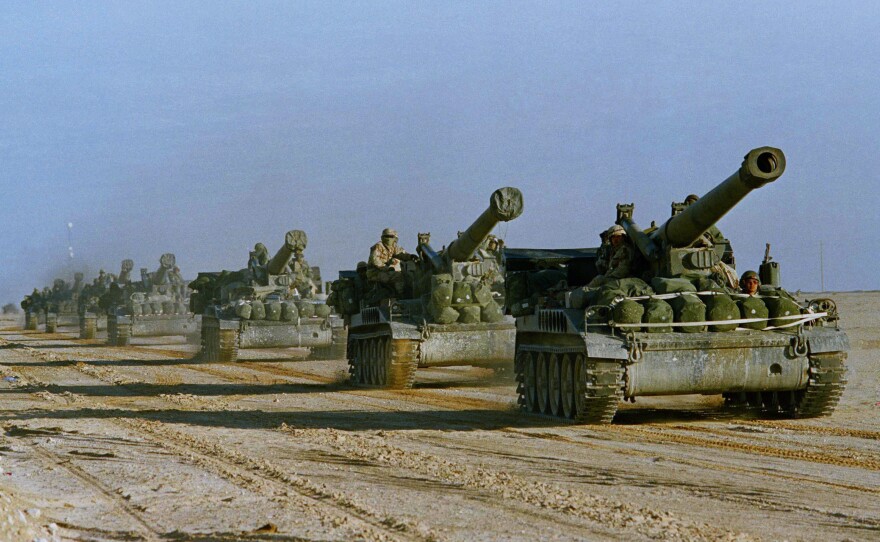 U.S. Army howitzers in Saudi Arabia head toward the Kuwait border in 1991, part of the effort to drive the Iraqi military out of Kuwait. The U.S. military has been involved in Iraq almost nonstop for more than two decades.
