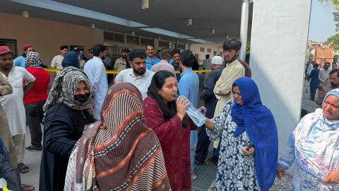 Relatives of the children who died in a hospital fire, gather at the hospital, in Islamabad, Pakistan, Wednesday, Aug. 26, 2026.