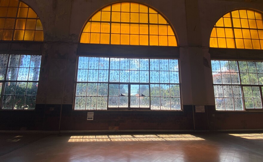 In the main hall of the former ESMA, the windows are filled with images of civilians who were detained, tortured and killed here. Because their captivity was never acknowledged by the regime, they are known as "the disappeared."