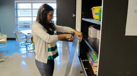 Candice Director making the last fixes to her classroom before the start of school, August 24, 2011.
