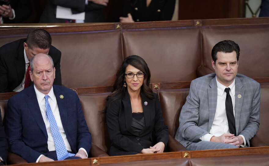 Reps.-elect Dan Bishop (R-NC), Lauren Boebert (R-Colo.), and Matt Gaetz (R-Fla.) watch floor proceedings as the search for speaker continued for a fourth day.