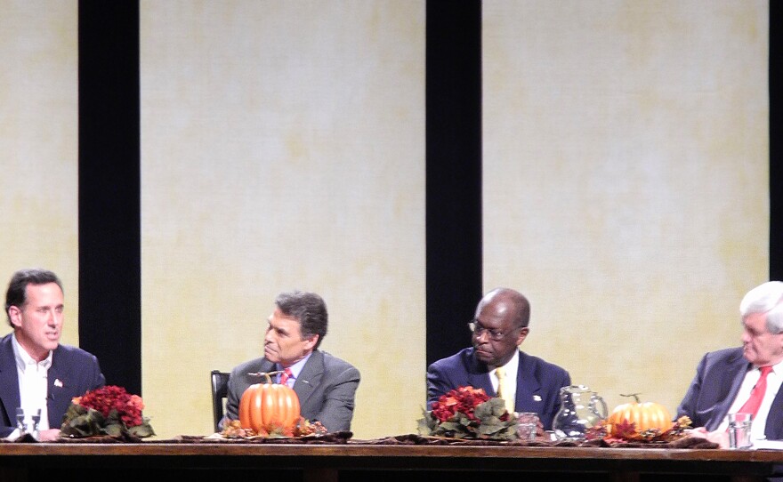 2012 Republican presidential candidates talk during the Thanksgiving Family Forum discussion in 2011. Organizer Bob Vander Plaats has a track record of endorsing Iowa Caucus winners — including former Pennsylvania Sen. Rick Santorum (far left) in 2012 and former Arkansas Gov. Mike Huckabee in 2008.