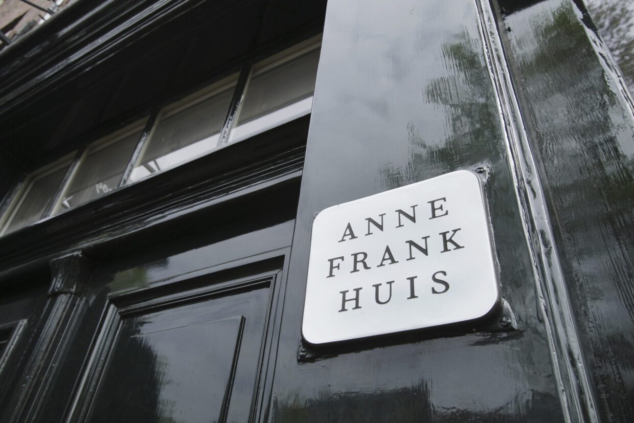 Anne Frank (1929-1945) house at the Prinsengracht canal during the Remembrance Day to celebrate 77 Years of the War victims on May 4, 2022 in Amsterdam, Netherlands. Remembrance Day commemorates civilians and Dutch soldiers who have died in wars or peacekeeping missions since the outbreak of the Second World War.