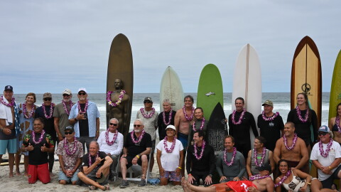 Surf invitational participants pose for a photo at Scripps Beach, Aug. 15, 2026.