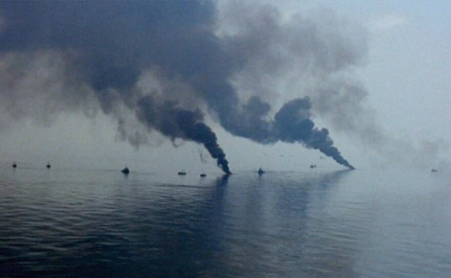 Rig wreckage on fire following the Deepwater Horizon explosion (courtesy U.S. Coast Guard).