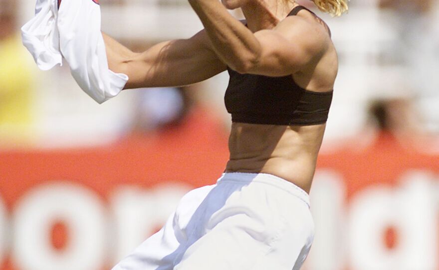 Brandi Chastain celebrates after kicking the winning penalty kick at the 1999 women's World Cup final against China on July 10, 1999.