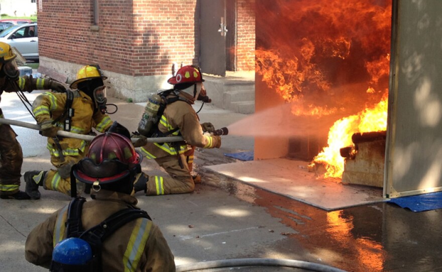 David Pogue (upper middle left) and firemen extinguish fire with Tetra KO.