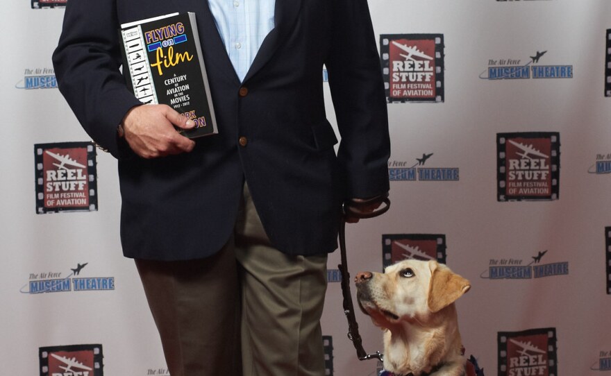 Mark Carlson joined by his guide dog Musket in this undated photo.