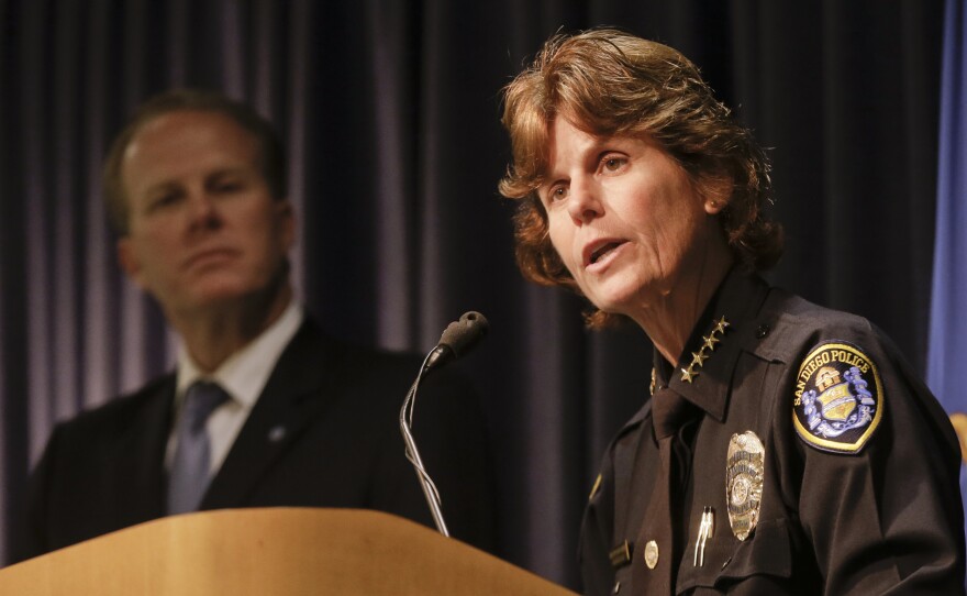 San Diego Police Chief Shelley Zimmerman talks about a federal investigation of the San Diego Police Department as Mayor Kevin Faulconer stands beside her on March 24, 2014.