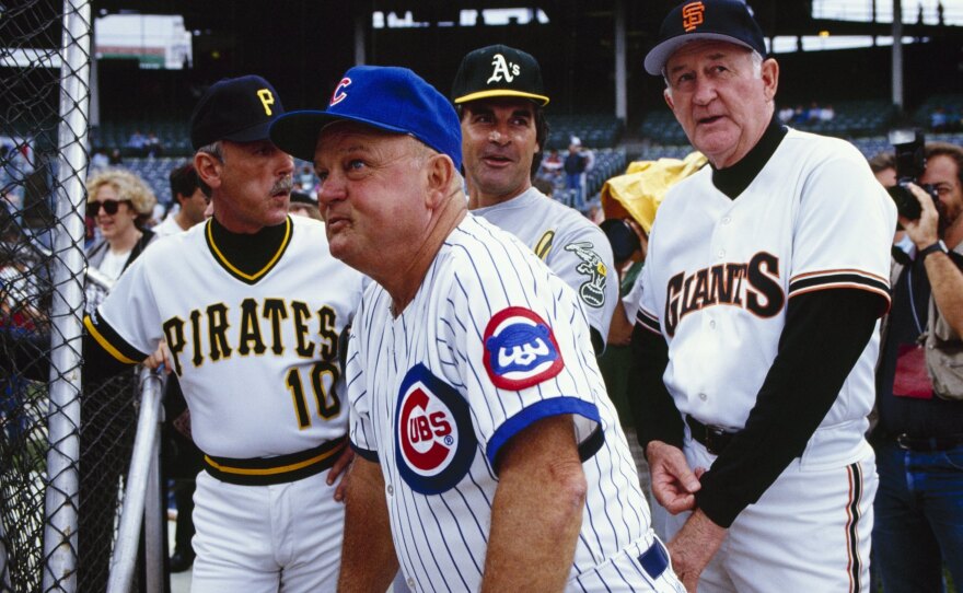 Don Zimmer, manager of the Chicago Cubs, watches battnig practice before the 1990 All-Star game with fellow managers Jim Leyland of the Pittsburgh Pirates, Tony LaRussa of the Oakland Athletics and Roger Craig of the San Francisco Giants at Wrigley Field.