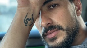 Ibrahim Hassouna, 30, a Gaza social media influencer known as Kazanova, has the phrase "my mom" tattooed on his wrist in Arabic. Most of his family was killed in a Feb. 12 Israeli military operation to rescue hostages.