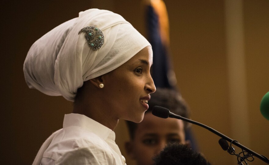 Ilhan Omar, a Democratic candidate for state representative in Minnesota, gives an acceptance speech on election night in Minneapolis.