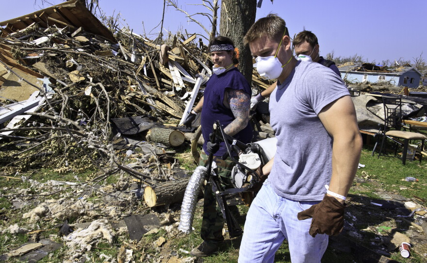One of the first priorities after the tornado hit was to clear millions of cubic yards of debris, an effort undertaken by government contractors, the private sector, voluntary agencies, faith-based organizations and everyday citizens.