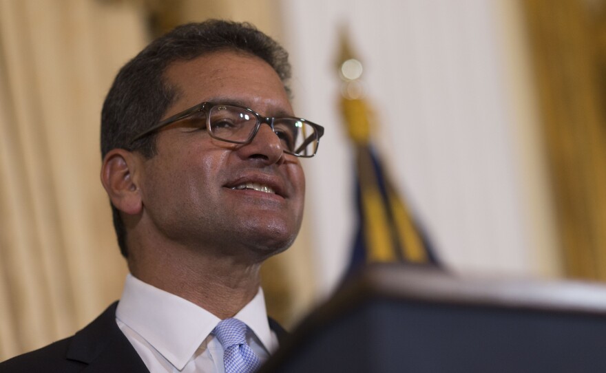 Pedro Pierluisi, sworn in as Puerto Rico's new governor, speaks during a press conference, in San Juan, Puerto Rico, on Friday.