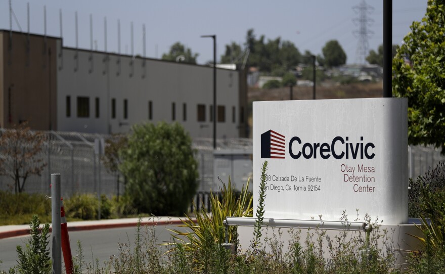 A sign for the Otay Mesa Detention Center sits in front of the building Tuesday, July 7, 2020, in San Diego.