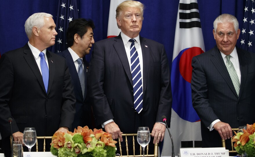 Japanese Prime Minister Shinzo Abe walks to his seat at a luncheon with President Donald Trump and South Korean President Moon Jae-in at the Palace Hotel during the United Nations General Assembly, Thursday, Sept. 21, 2017. 