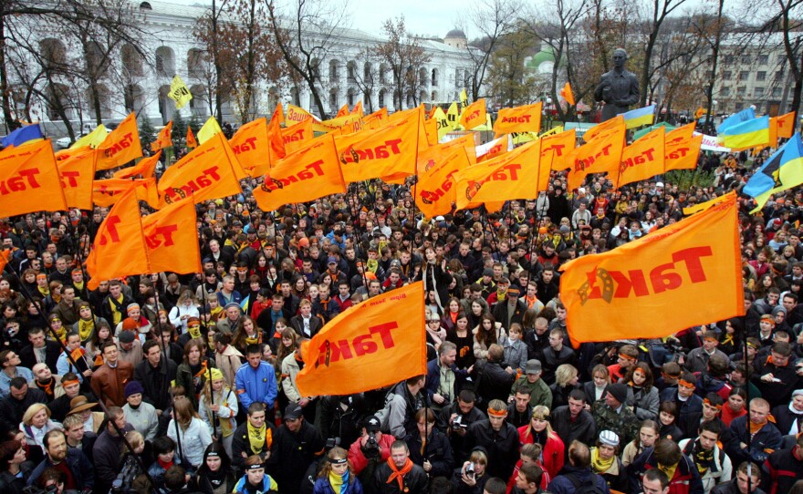 Ukrainians in the capital Kyiv take part in the 2004 "Orange Revolution." The demonstrators protested against what they said were Russian attempts to rig the country's presidential election.