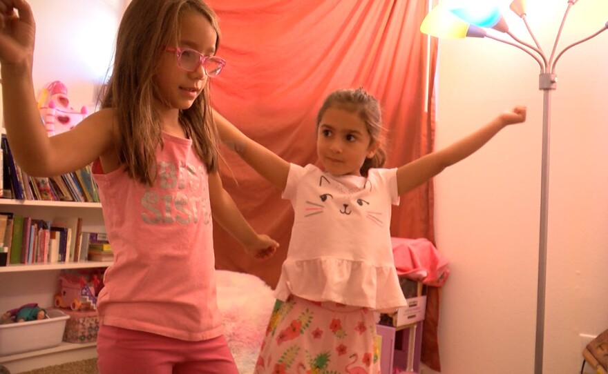 Maya Ramos and Kaia Cagasan do their gym class over Zoom from Ramos's San Carlos home, Oct. 5, 2020.