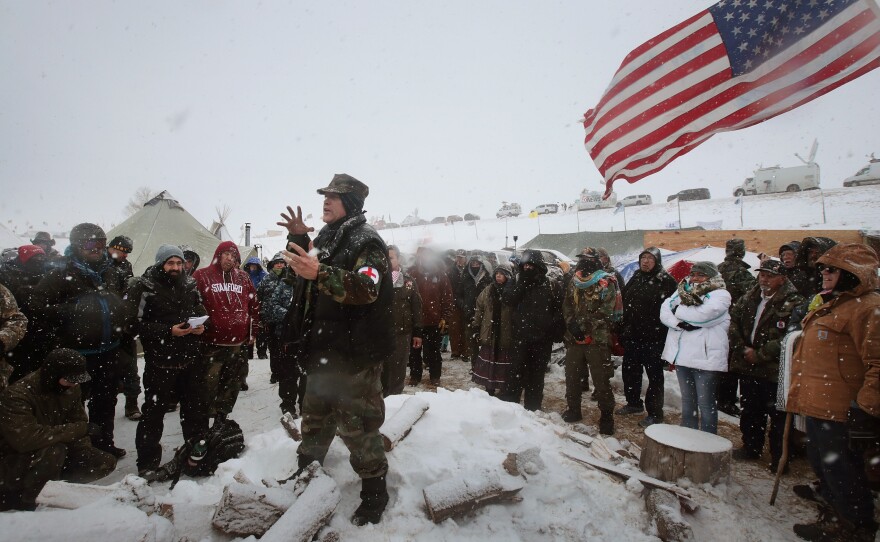 Military veterans are briefed on their role at Oceti Sakowin Camp and on cold-weather safety on Monday. Over the weekend, a group of veterans joined activists who have been trying to halt the construction of the Dakota Access Pipeline.