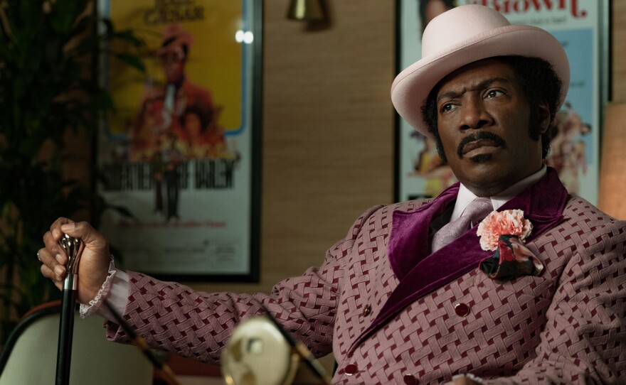 In Dolemite Is My Name, Eddie Murphy leads the star-studded biopic about Rudy Ray Moore, whose iconic alter ego became a blaxploitation legend.