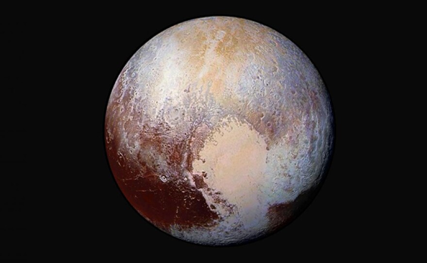 Enhanced color photo of Pluto.