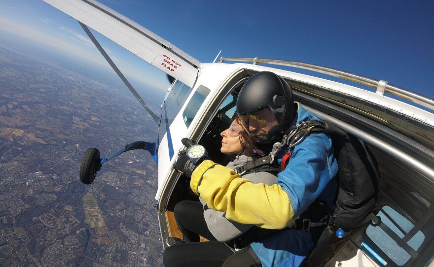 Hanna prepares to jump from the plane.