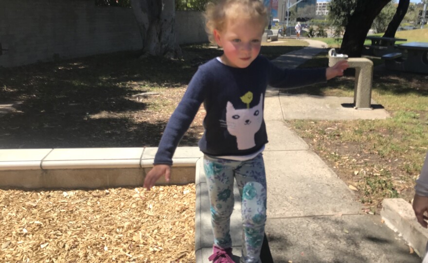 Three-year-old Amelia Hurvitz, who is among 50 children since January to be diagnosed with Kawasaki disease in San Diego County, plays at a park in University City, April 17, 2019.