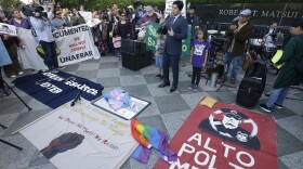 State Sen. Kevin de Leon, D-Los Angeles, speaks at demonstration outside the federal courthouse where a federal judge will hear arguments over the U.S. Justice Department's request to block three California laws that extend protections to people in the country illegally, Wednesday, June 20, 2018. 