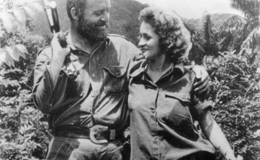 William Morgan and wife Olga in mountains with guns.