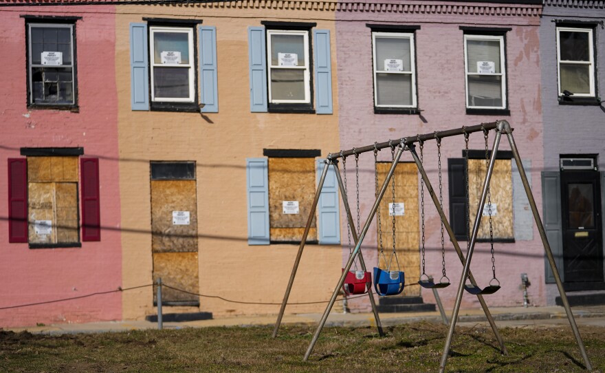 Boarded doors and windows on Feb. 15, 2023, in Baltimore, where Black residents have alleged that redevelopment policies perpetuate racial discrimination.