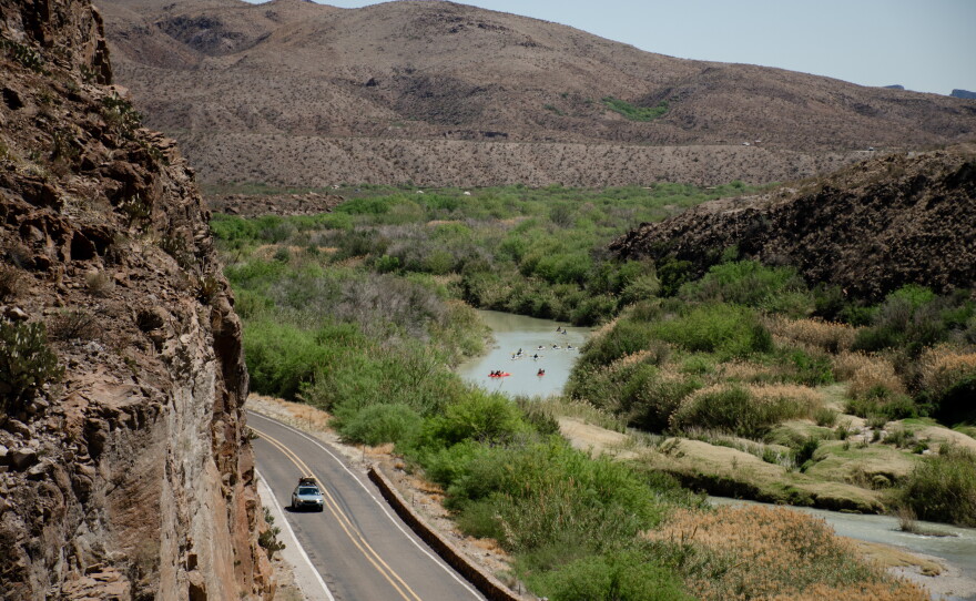 A group kayaks down the Rio Grande as it courses through the Big Bend. River guides and local outfitters worry a wall would cut off their access to the Rio Grande and devastate their livelihoods.