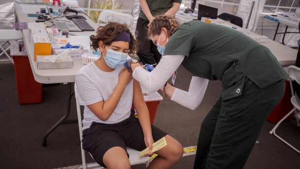 12-year-old Pablo Cortez  received the Pfizer COVID-19 vaccine at the Family Health Centers of San Diego in Barrio Logan, May 13, 2021. 