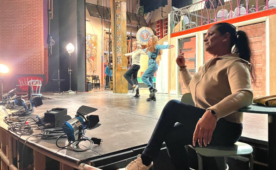 Grace Japheth (foreground) plays the Emcee in the musical "Cabaret" opening this Friday at San Diego City College's Saville Theatre. Choreographer Kristin Arcidiacono rehearses with Megan Padilla who plays Sally Bowles, San Diego, Calif., April 19, 2023.