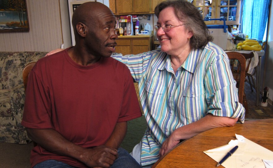 Bobby Harper, with his wife, Sherill, lives across the alley from Cobb. He says he was prepared to tolerate Cobb as long as he kept to himself, but he's angry now that Cobb has invited other white supremacists to join him.