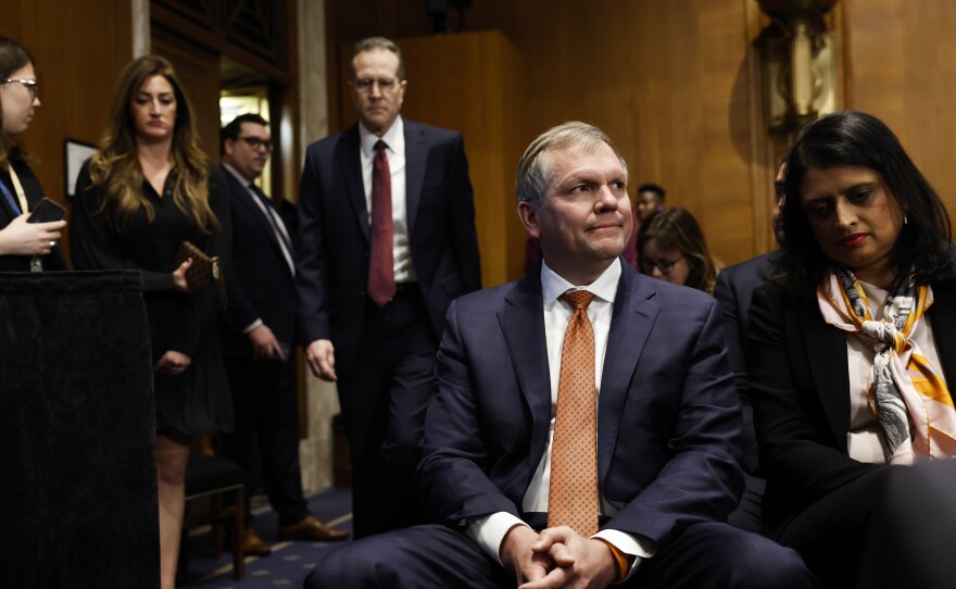 Alan Shaw, president and CEO of Norfolk Southern Corporation, waits to sit on a panel to testify before the Senate Environment and Public Works Committee on Capitol Hill on March 9.