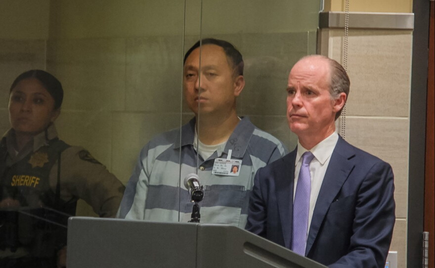 Kenneth Chee (center), owner of Devastating Pyrotechnics, makes his first appearance in Yolo County court after being indicted in connection to the deadly July 1 Esparto fireworks explosion Thursday, April 23, 2026 in Woodland.
