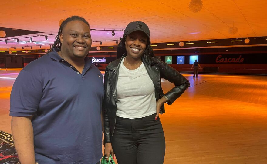 Dean Anthony, left, and Nina Smith at Cascade roller skating rink in Atlanta. Anthony and Smith are Democratic strategists encouraging candidates to embrace Black voters where they are - like at this rink, a cornerstone of the community.