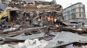 Rescuers search for survivors in a collapsed building in Manchester Street on February 22, 2011 in Christchurch, New Zealand. The 6.3 magnitude earthquake - an aftershock of the 7.1 magnitude quake on September 4 - struck 20km southeast of Christchurch at around 1pm local time, with initial reports suggesting damage and fatalities far exceeding the initial quake. 