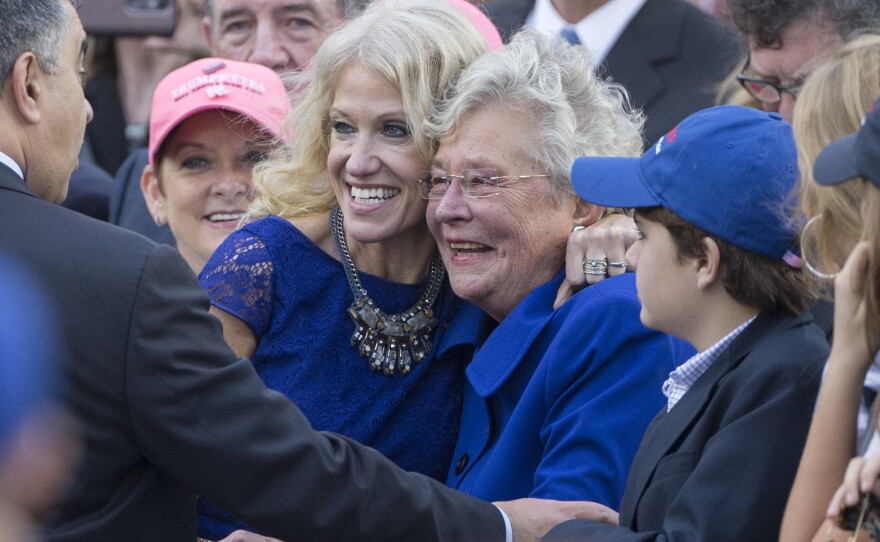 Kellyanne Conway poses with then-Alabama Lt. Gov. Kay Ivey last year. Ivey is now governor and said she's still voting for Roy Moore even though she said she has no reason to disbelieve his accusers.